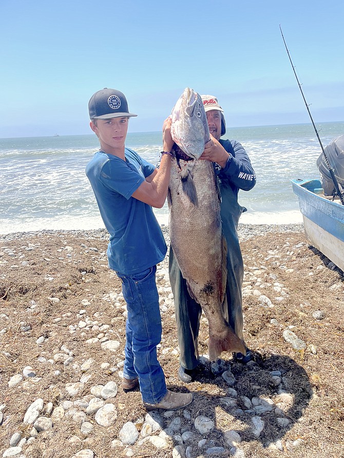 Douglas High School student Dylan Prater with a white sea bass caught last week in San Quintin Baja Mexico. Photo special to The R-C by Terry Davis