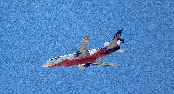 This photo of a jet tanker was modified in Photoshop.