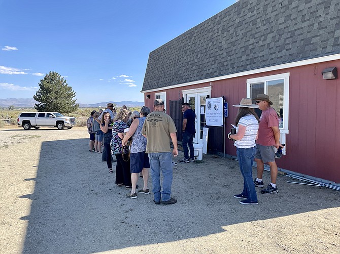 Residents gathers outside the Washoe Development Corp. Red Barn on Tuesday. Neighbors to a new sawmill on tribal land expressed concerns about environmental impacts.