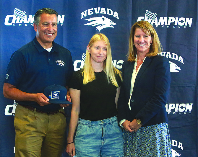 The University of Nevada announced it was bringing back its ski program Wednesday. Pictured from left are University President Brian Sandoval, ski coach Mihaela Kosi and Wolf Pack AD Stephanie Rempe.