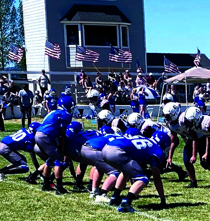 Sierra Lutheran’s defensive line sets its front at Loyalton over the weekend. The Falcons forced a pair of turnovers and found some offensive footholds in the team’s first contest of the year.