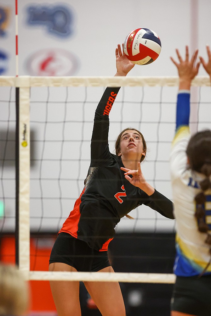 Sofia Kolbe goes up for a kill against Reed last week. Kolbe is one of the Tigers’ three captains this fall.
