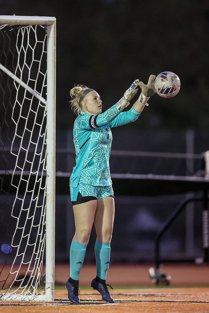 Douglas High goalkeeper Kylie Martin pulls down a save against Spanish Springs earlier this season. In a 1-1 draw against Reno, Martin was complimented by her head coach for being the reason Douglas was able to stay in the contest.