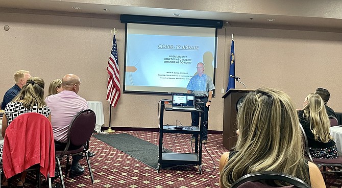 Carson City Dr. Merritt Dunlap, center, speaks to the Chamber of Commerce on Sept. 13, 2022 at Gold Dust West.