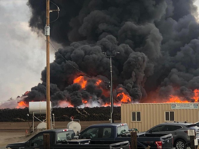 Flames and smoke engulf piles of railroad ties at Omaha Track on Sept. 7.