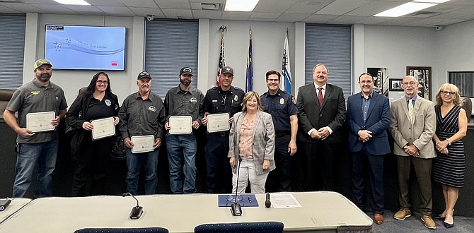 Left to right: Daniel Kastens, parks operations manager (10 years); Renay Lapaille, juvenile detention shift supervisor (10 years); Terrance Swanson, senior street technician (10 years); Gary Wood, street technician 3 (10 years); Casey Drews, fire prevention inspector 2 (5 years); Mayor Lori Bagwell; Fire Chief Sean Slamon; Supervisor Stacey Giomi; Supervisor Maurice White; Supervisor Stan Jones; and Supervisor Lisa Schuette.