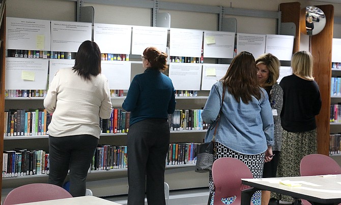 Carson City School District administrators, including Merri Pray, Cheryl Macy, Tasha Fuson and Tanya Scott, provide feedback and think of ways to develop improvements for the district’s strategic plan on Sept. 21, 2022 at Carson High.