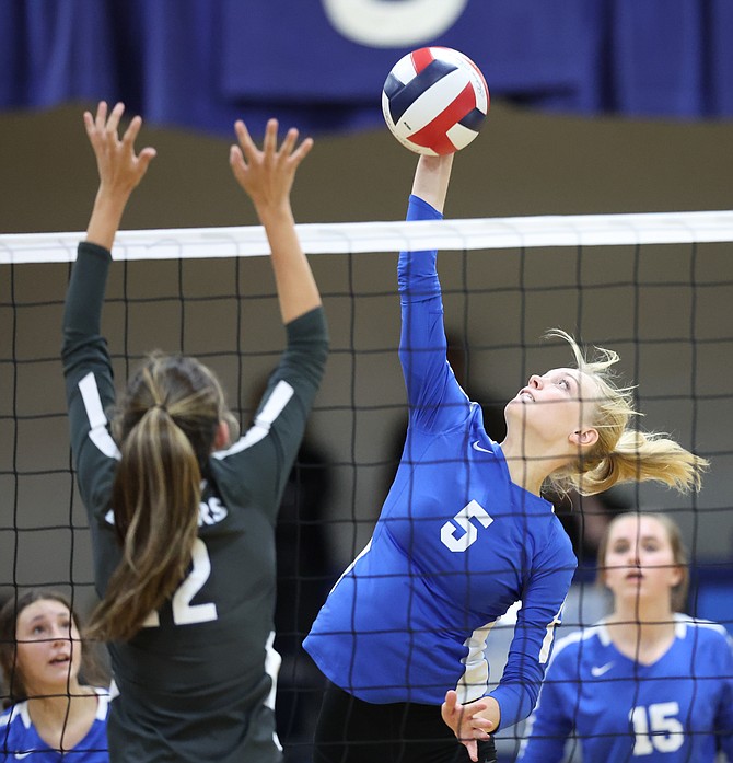 Anna Turner (5) goes up for a kill against McQueen on Tuesday. Turner has 91 kills, sixth-most in Northern Class 5A.
