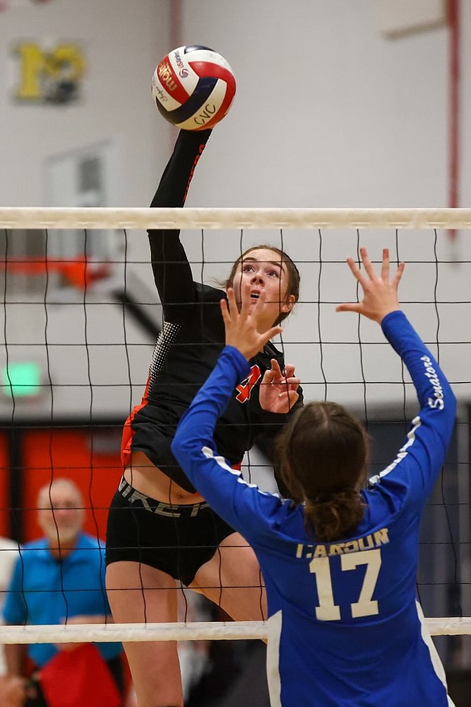Addy Doerr goes up for one of her nine kills Thursday at home against Carson.