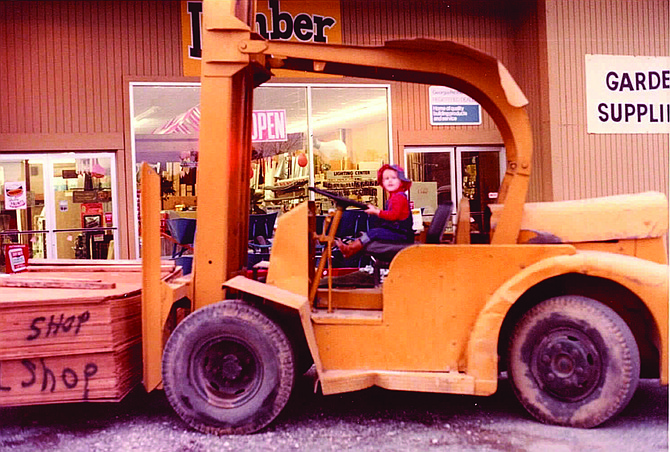 Sarah Johns in a dozer at her family’s small-town hardware store, Don’s True Value, in Auburn.