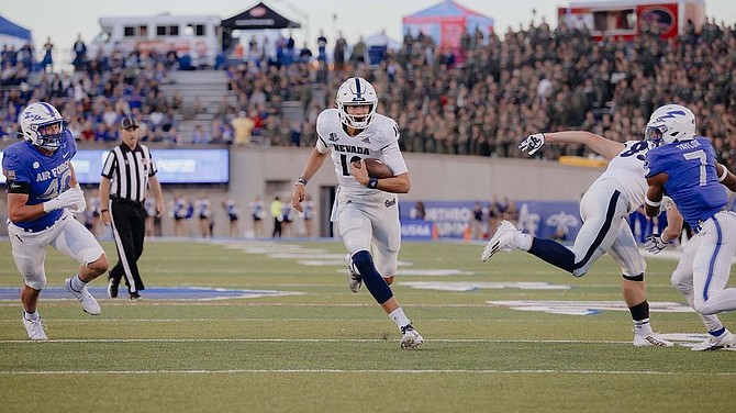 Nevada quarterback Nate Cox running against Air Force on Sept. 24, 2022 in Colorado Springs, Colo.