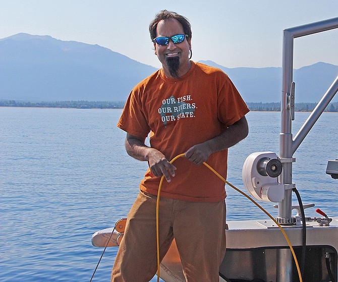 Sudeep Chandra shown on a Lake Tahoe research vessel.