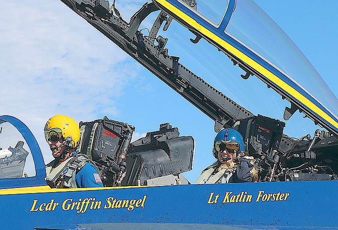 Virginia City High School Counselor Caren Baum waves as she prepares for take-off with Blue Angels’ Pilot Lt. Griffin Stangel Wednesday.