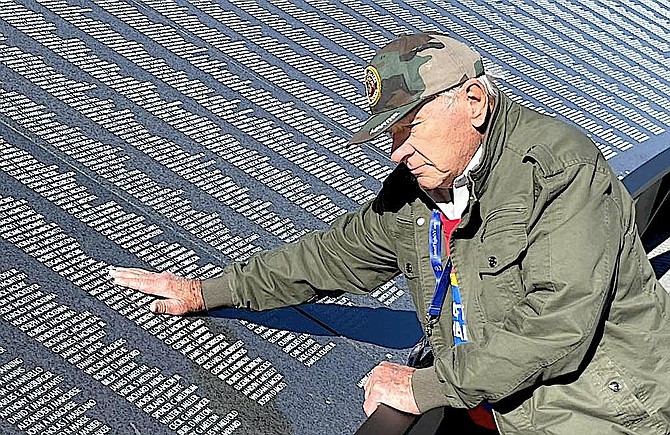 Marine veteran Jack Navone reflects after looking up the names of friends who were lost in the Korean War. Honor Flight Nevada photo