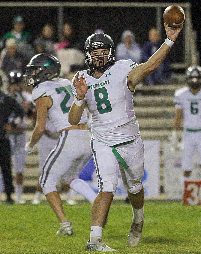 Junior Bryce Adams threw for more than 300 yards in the Greenwave’s 49-19 win over Spring Creek on Friday.