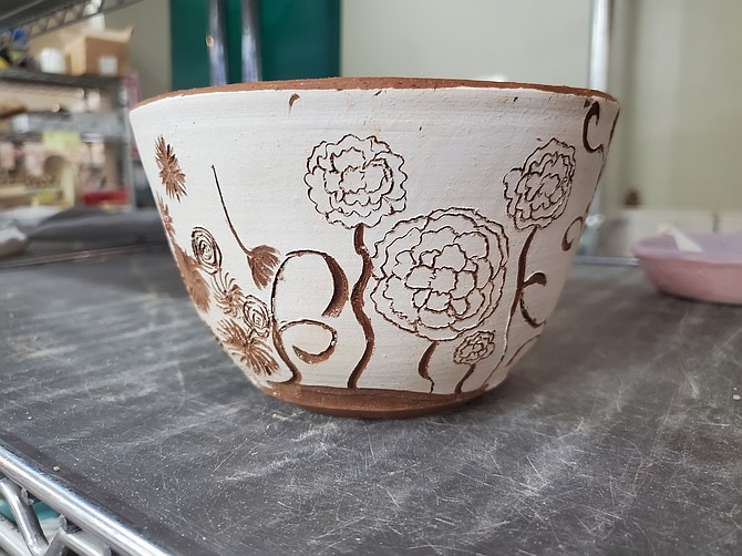 An unfired piece of pottery using the sgraffito method that will be used at the Ogres-Holm Pottery Studio class Oct. 14.