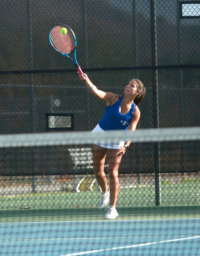 Carson High senior Ashleigh Naranjo serves during a singles match in the opening round of the Class 5A North regional tournament Monday against Galena.