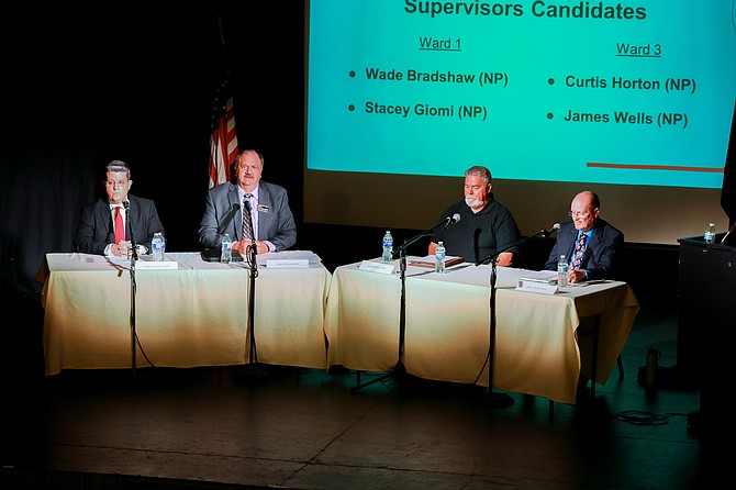 From left: Wade Bradshaw, Stacey Giomi, Curtis Horton and James Wells during Monday night’s forum for Carson City Board of Supervisors candidates.