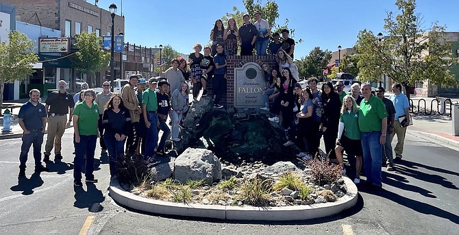 Churchill County High School students and the city celebrate the beginning of homecoming week at the Maine Street fountain.