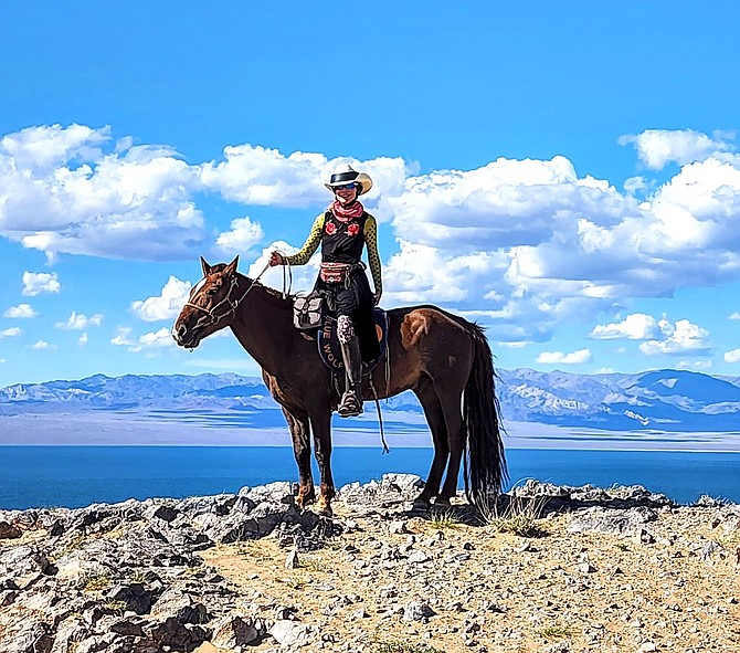 Betsy Cooksey on day 5 of the May charity ride. She traveled, camped and ate in the snow and wind while heading north from the capital of Ulaanbaatar towards Russia.