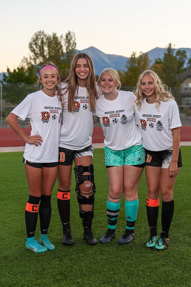 The seniors of Douglas High girls soccer pose for a photo during Senior Night. Pictured from left to right are Kylee Lash, Camden Miller, Kylie Martin and Seara MacPherson.