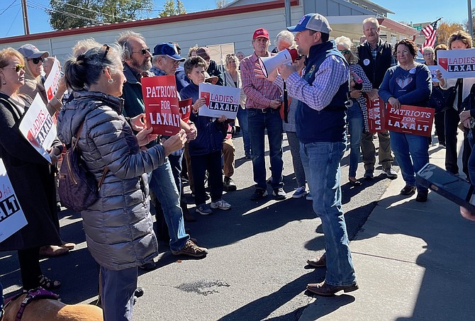 Adam Laxalt, Republican candidate for U.S. Senate, talks to supporters Wednesday at the Carson City Republican Party headquarters. The Adam Laxalt for U.S. Senate bus tour made additional stops in Fallon and Fernley and also stopped Thursday at Virginia City and Minden.