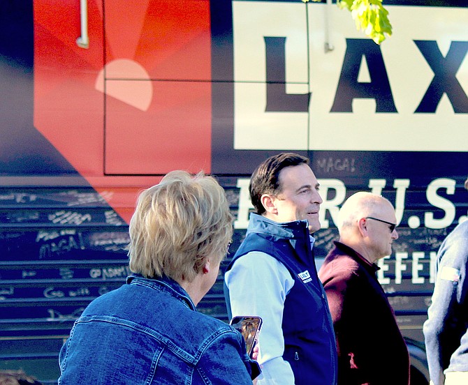 Adam Laxalt talks to supporters during Thursday's stop in Minden.