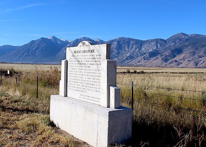 A monument recognizing Carson Valley as Nevada's birthplace stands at Highway 395 and Genoa Lane with the same mountains people have admired for millennia standing in the background.