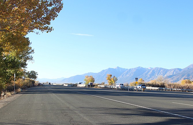 Highway 395 is scheduled to be down to two lanes for repaving 3 a.m. to 3 p.m. Monday near Cradlebaugh Bridge.