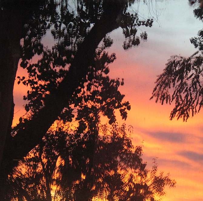 Sunrise on Oct. 27 reflected in a window.