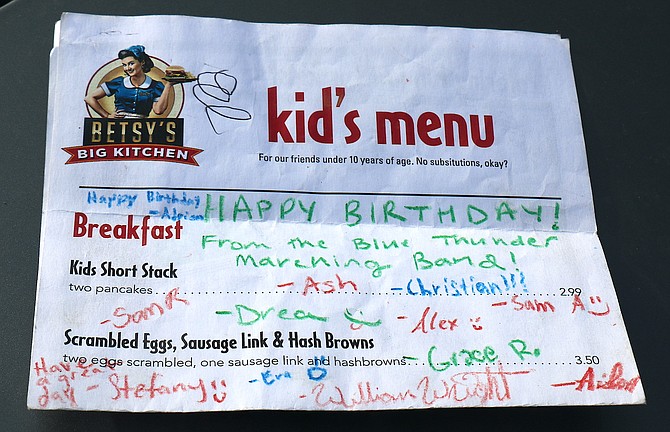 Carson City resident Fred Wiersma says a group of Carson High School Blue Thunder Marching Band students made his birthday memorable by singing to him and signing a personal birthday card on a Betsy’s Big Kitchen kids’ menu during his dinner.