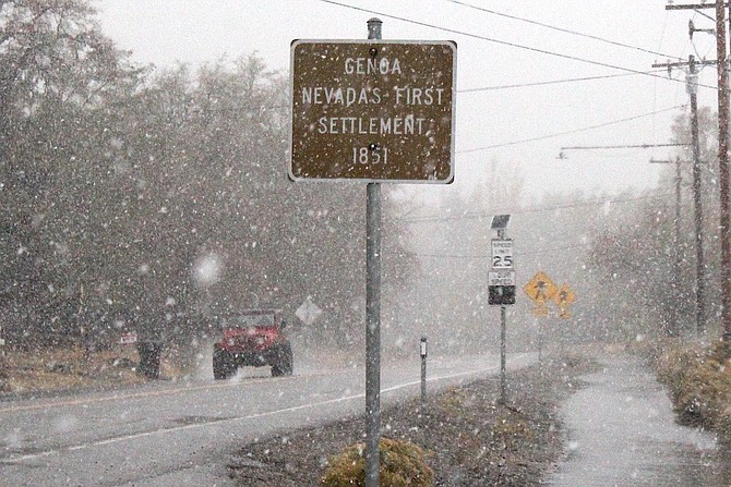 Snow falls in Genoa  around 4:30 p.m. Tuesday as a winter storm makes its way down into the Valley.