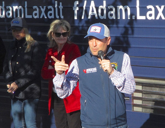 Adam Laxalt, Republican candidate for U.S. Senate, talks to supporters Wednesday at Millennium Park.
