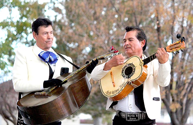 Mariachi Cazadores De Nevada wrap up the Día De los Muertos festival at Heritage Park on Saturday evening.