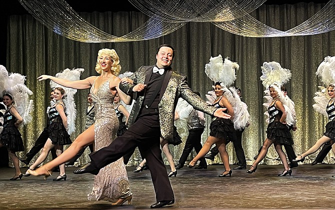 Melanie Gill and Alex Gumm perform in Western Nevada Musical Theatre Company’s production of ‘Holiday Inn’ at the Carson City Community Center. In the background are Cassidy Buchan, Alexandria Bennet, Robin Kato, Eleanor Joiner Davis and Romi Williams.