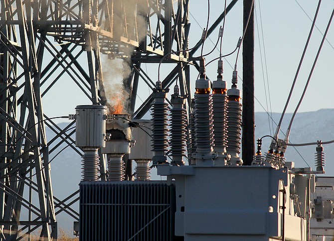 A transformer continued to burn at the Buckeye Substation more than two hours after an outage affected more than 20,000 Douglas County homes and businesses.
