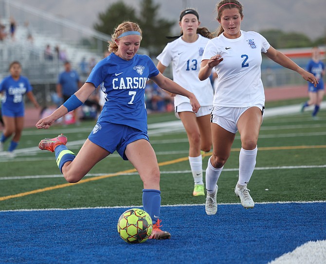 Carson’s Gracie Walt dribbles out of pressure against Spanish Springs earlier this season. Walt earned Defensive Player of the Year for her performance on the pitch this fall, helping the Senators earn a home playoff game for the first time since 2016.