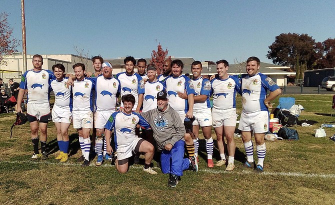 The Carson-Tahoe Blue Bull rugby team poses for a photo after participating in the Chico Holiday Rugby Classic.