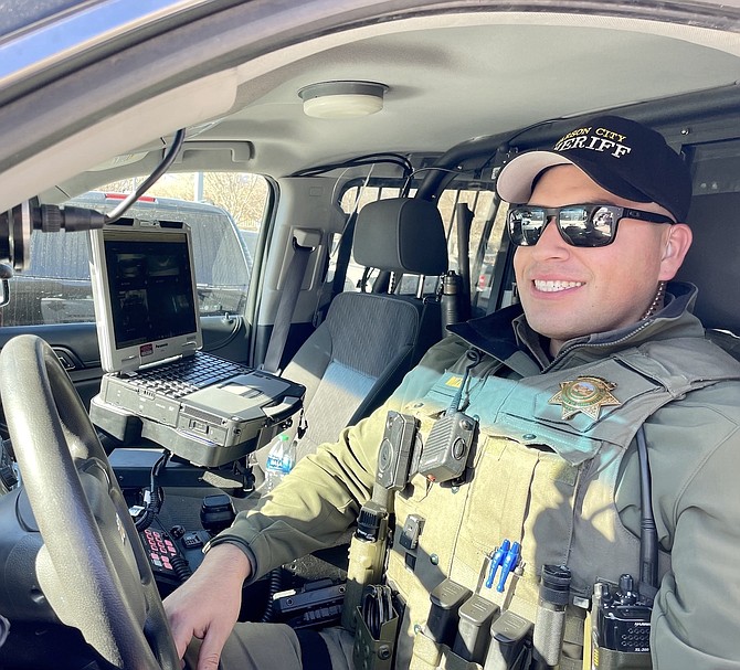 Carson City Sheriff’s Deputy Angel Meza equipped with a body and car camera Nov. 29.