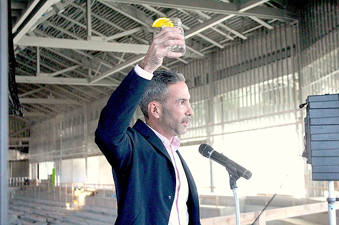 Tahoe Blue Vodka founder and CEO Matt Levitt raises a glass in celebration of naming the Tahoe Blue Events Center.