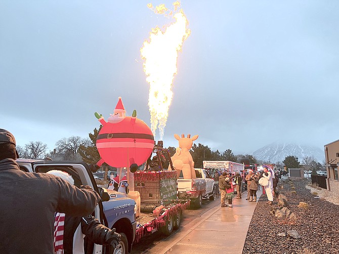 Balloon Nevada fires off a burner on Saturday as part of the HopeFest entry just prior to the start of the 2022 Parade of Lights.