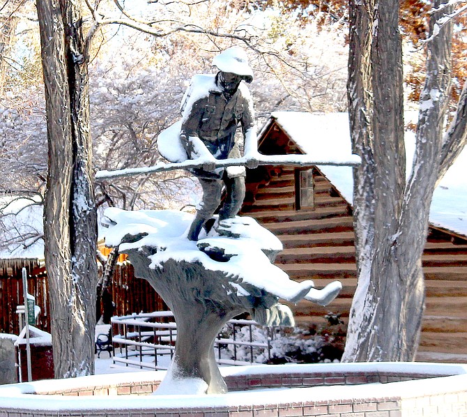 The statue of Snowshoe Thompson in its natural element on the morning of Dec. 2 after a snowstorm in Genoa.