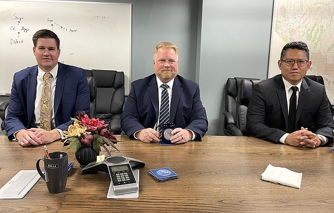 From left, Chief Deputy District Attorney Garrit Pruyt, Carson City District Attorney Jason Woodbury, and Assistant District Attorney Dan Yu in the Carson City Courthouse on Dec. 5.