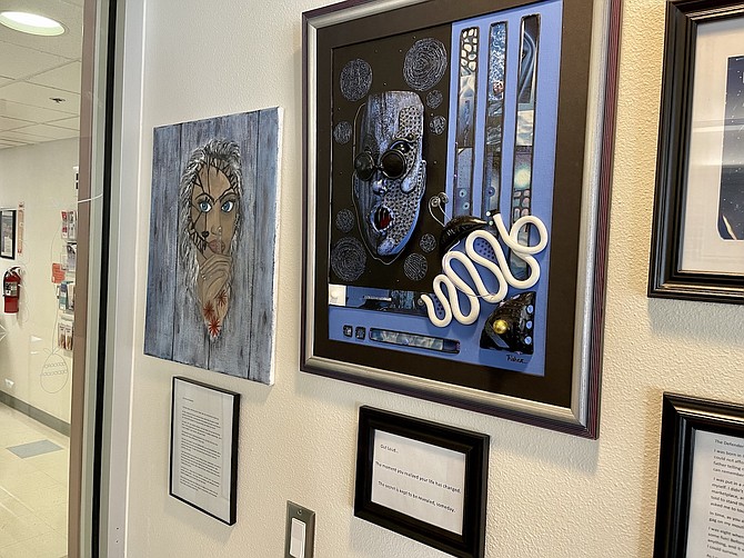‘Out of the Woodwork,’ left, and ‘Out Loud’ at the CCHHS AIDS art exhibit on Dec. 7.