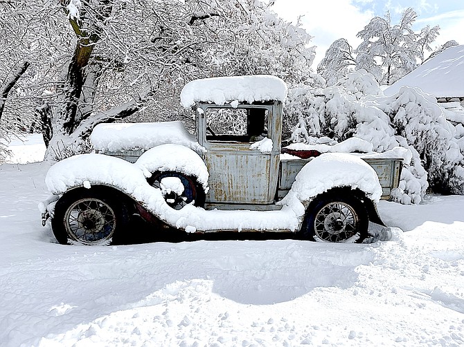Snow coats a 1931 truck in this photo by Genoa resident Roger Falcke.