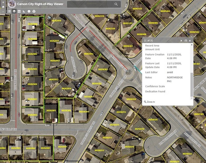 A graphic provided by Carson City Transportation Division showing GIS mapping software. The gray shaded areas depict city right of way. When the area is selected, a dialog box opens and displays a description of the right of way and a link to relevant documents.