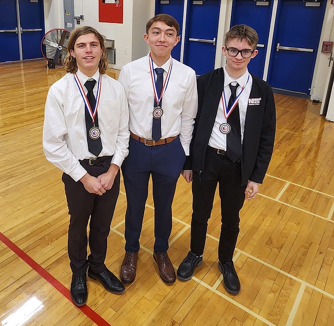 From left are Joshua Gusewelle, Zach Budner and Clint Vaughn, who competed in the We the People Northern Nevada District Invitational.