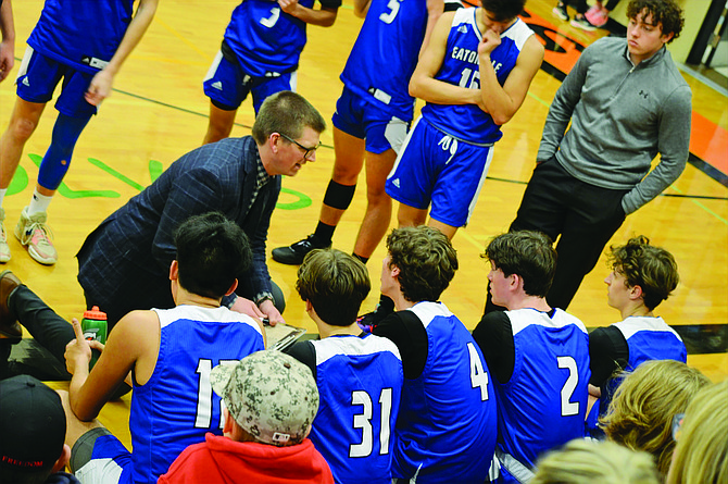 Eatonville boys basketball coach TJ Cotterill instructs the Cruisers during their game against Morton-White Pass, Dec. 19.