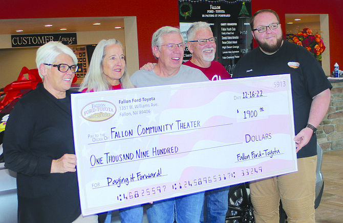 Members from the Fallon Community Theatre and Fallon Ford-Toyota are all smiles as they display a $1,900 check from the Pay It Forward program. From left are Valerie Santiago, theater board members Karla Kent, Glen Perazzo and Mike Berney, and Kevin Thomas.
