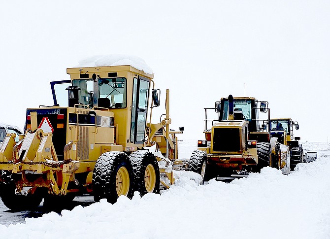 Heavy equipment was required to clear the runway at Minden-Tahoe Airport after 18 inches of snow fell. 
Minden-Tahoe Airport photo